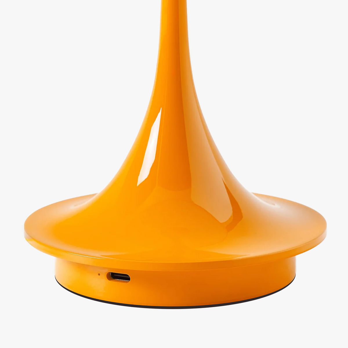 Sleek orange modern lamp base with USB-C port, minimalist design for contemporary spaces