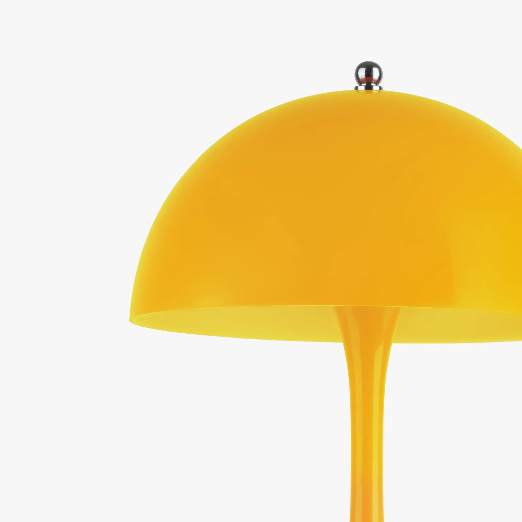 Vibrant yellow mushroom-style table lamp with sleek chrome finial, perfect for funky home decor