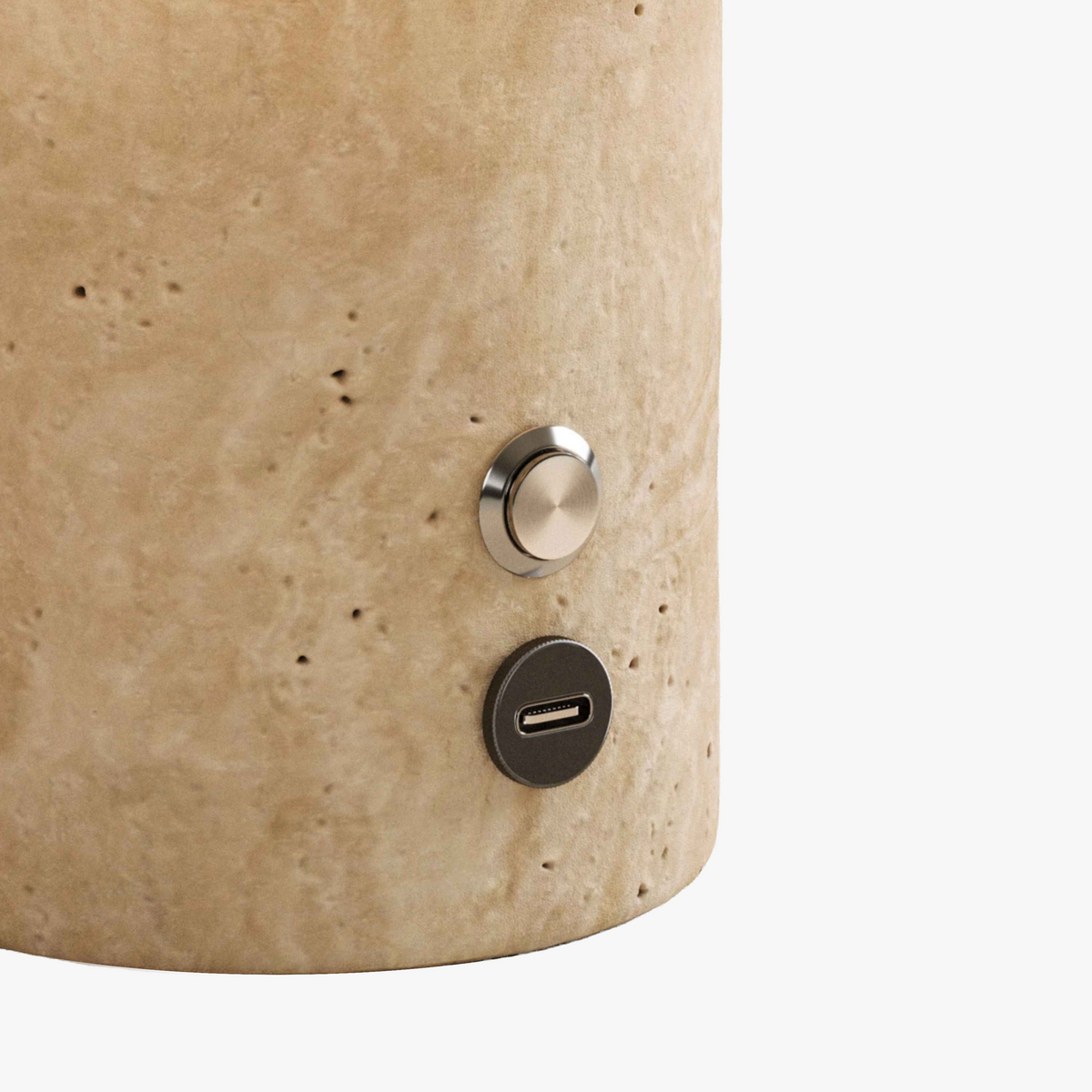 Travertine base of the Olbia Portable Lamp with metal push button and USB-C charging port