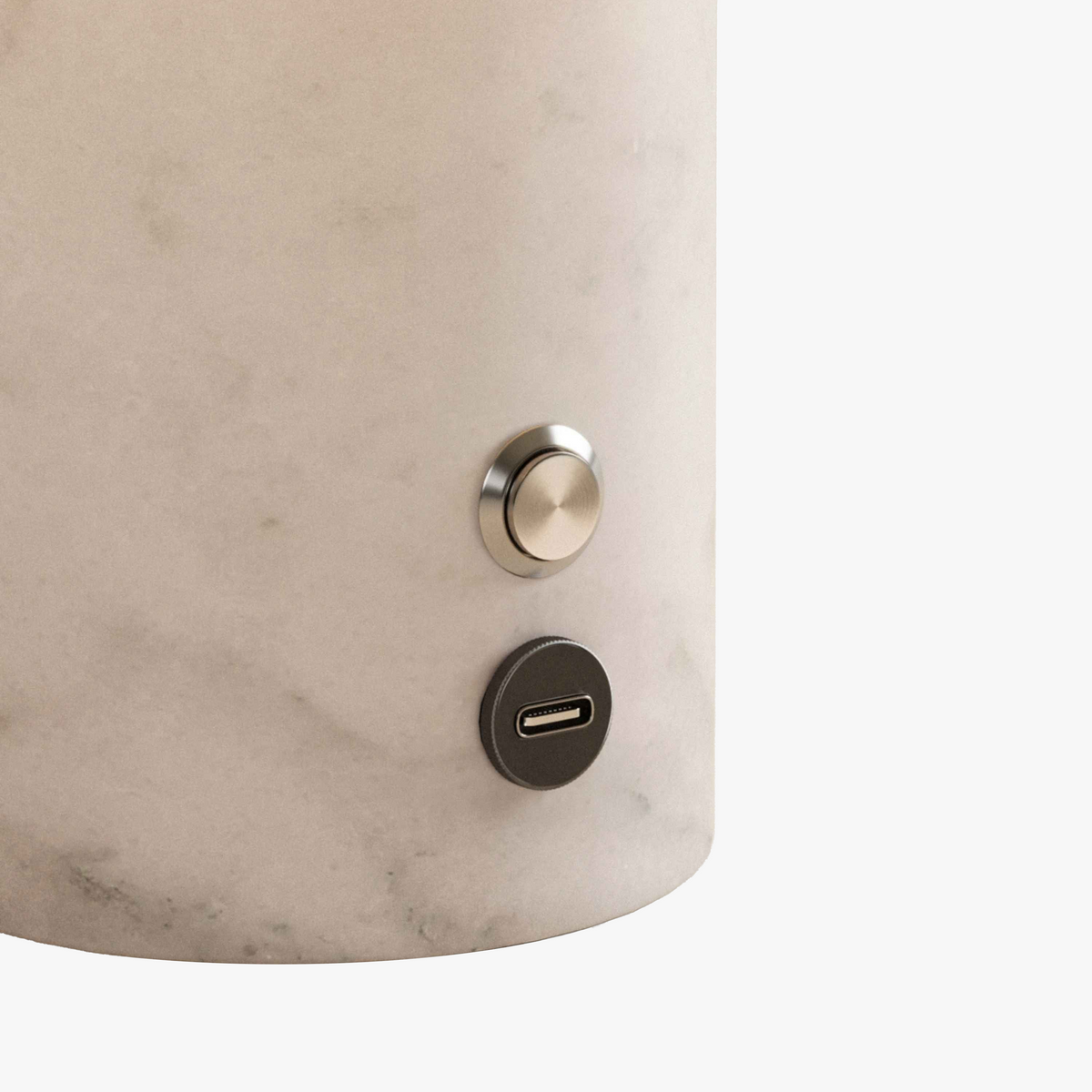 White Marble base of the Olbia Portable Lamp with metal push button and USB-C charging port