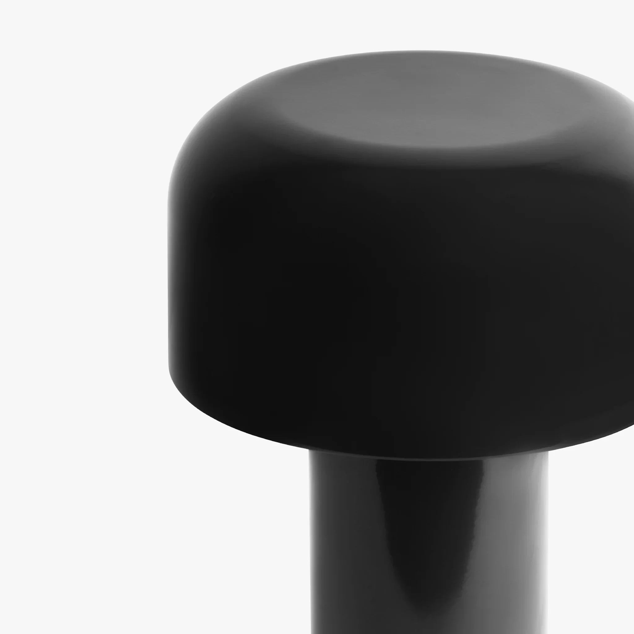 Sleek black modern table lamp with rounded dome shade, minimalist design for contemporary spaces